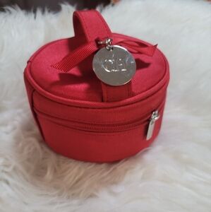 Carolina Herrera red round beauty case -TRAVEL  Cosmetic Bag with Silver Charm